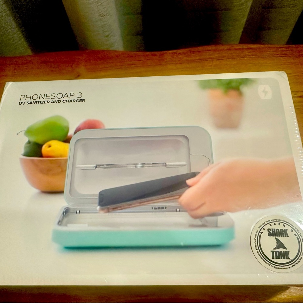 NWT Phonesoap3! SharkTank! Sanitize electronics safely! Sealed in package. Aqua